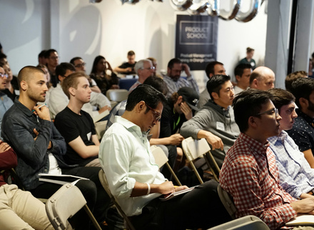 Audience in a small conference room